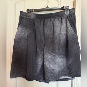 Lululemon Men’s Pace Breaker 9 inch non-lined shorts. Black with white coloring.